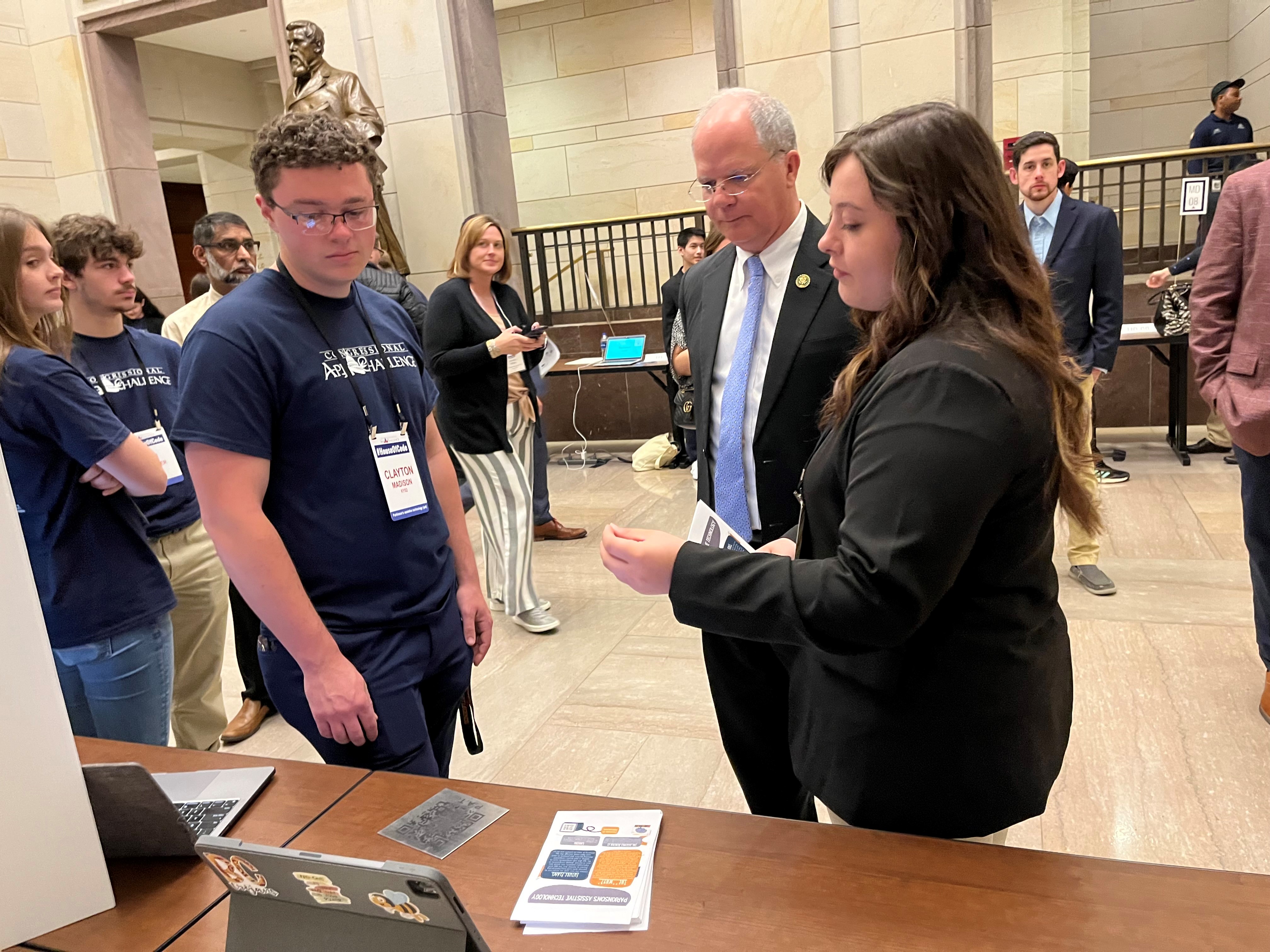 Rep. Guthrie watching the app presentation from KY-02’s winners