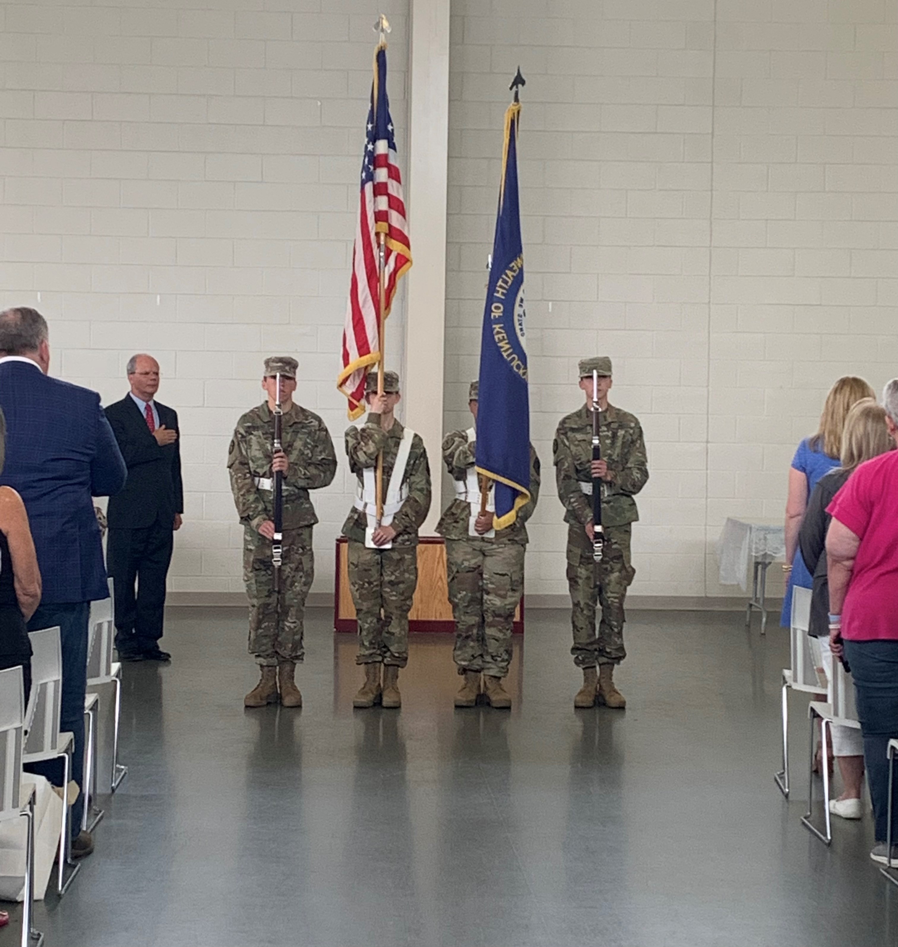 Rep. Guthrie presenting the Bronze Star Medal with “V” device to Sgt. Burlew